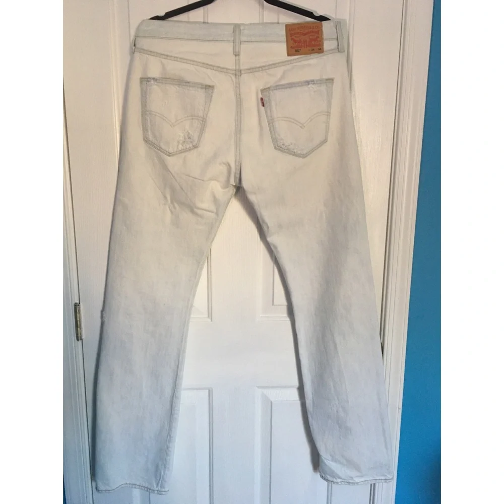 Levi’s 501 light(white) washed ripped jeans